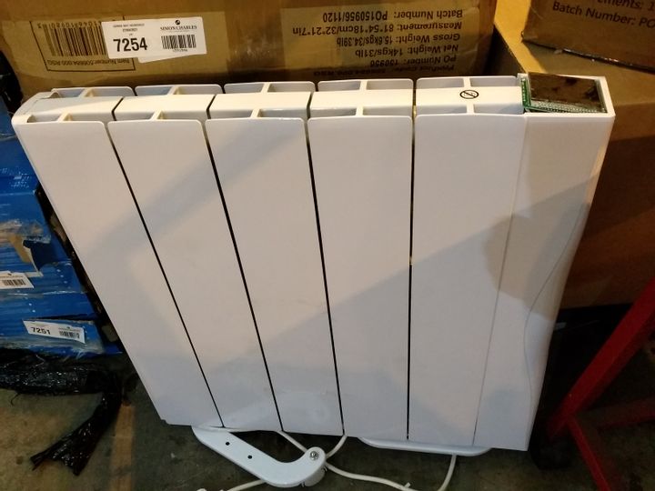 Lot 1041 WARM HOME 1500W CERAMIC RADIATOR Simon Charles Auctioneers