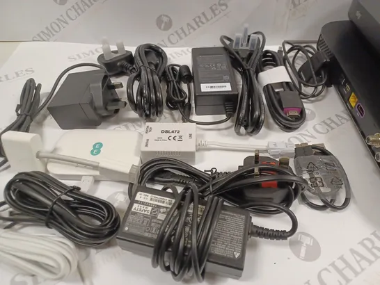 LOT OF ASSORTED TECH ITEMS TO INCLUDE SKY SET TOP BOXES AND VARIOUS CHARGERS AND CONNECTIVITY CABLES