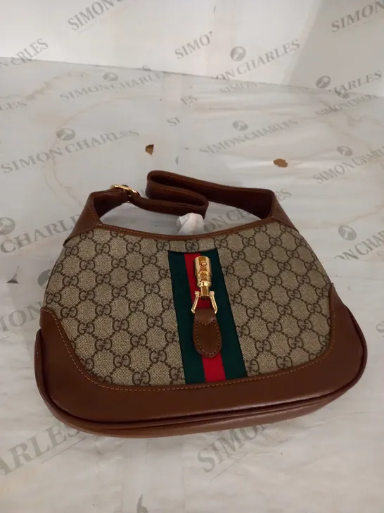 BROWN GUCCI STRAPPED BAG 