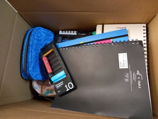 MEDIUM BOX OF ASSORTED NOTE BOOKS , SHARPIES AND PENCIL CASES 