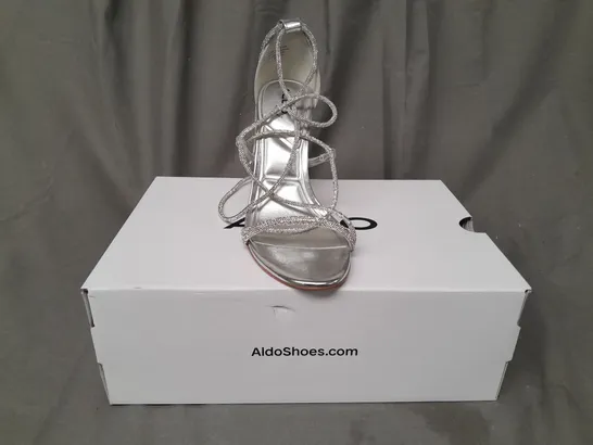 BOXED PAIR OF ALDO OPEN TOE HIGH HEELED STRAPPY SANDALS IN METALLIC SILVER W. JEWEL EFFECT UK SIZE 7