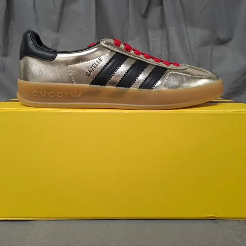 BOXED PAIR OF ADIDAS GUCCI GAZELLE SHOES IN METALLIC GOLD/BLACK UK SIZE 6