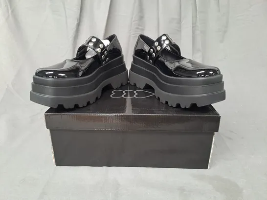 BOXED PAIR OF KOI CHUNKY PLATFORM SHOES IN GLOSSY BLACK SIZE 6