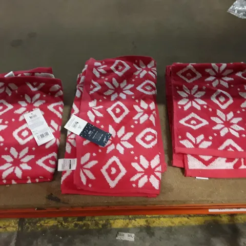 BOX CONTAINING APPROXIMATELY 24 PACKS OF 3 RED FAIRISLE GUEST TOWELS