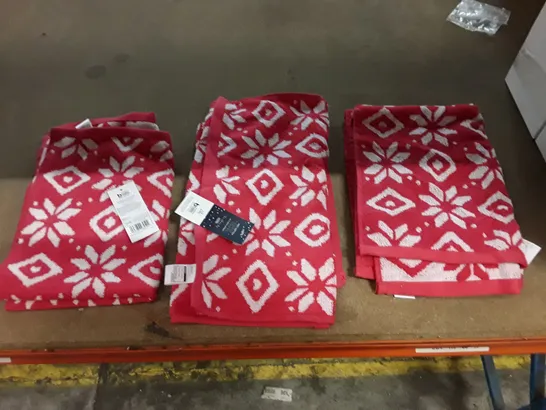 BOX CONTAINING APPROXIMATELY 24 PACKS OF 3 RED FAIRISLE GUEST TOWELS