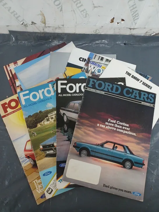 approx. 10 old car magazines from ford - fiat - citron   