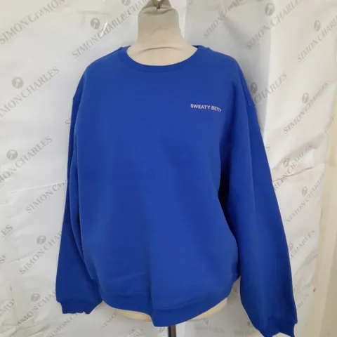 SWEATY BETTY ELEVATED SWEATSHIRT IN LIGHTENING BLUE SIZE M