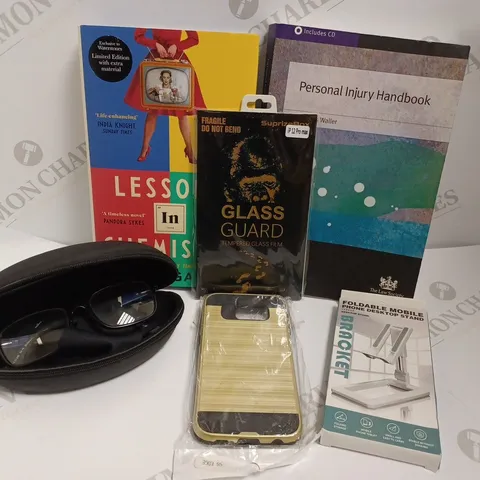 BOX OF APPROX 10 ITEMS INCLUDING LESSONS IN CHEMISTRY BOOK, GLASS GUARD PHONE SCREEN PROTECTOR AND FOLDABLE MOBILE STAND