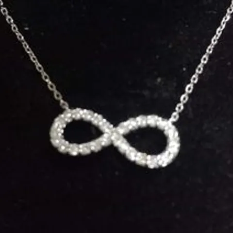 14CT WHITE GOLD INFINITY PENDANT SET WITH NATURAL DIAMONDS WEIGHING +0.30CT