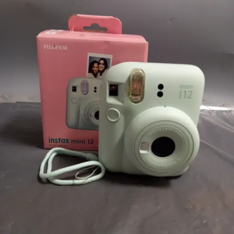 BOXED FUJIFILM INSTAX MINI 12 CAMERA IN MINT GREEN