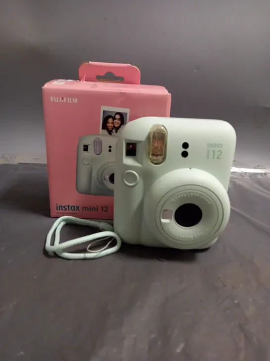 BOXED FUJIFILM INSTAX MINI 12 CAMERA IN MINT GREEN