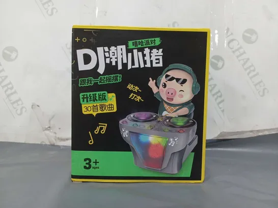 BOXED DJ SWINGING PIGGY TOY