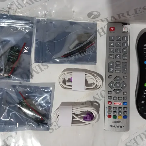 APPROXIMATELY 10 ASSORTED HOUSEHOLD ITEMS TO INCLUDE VIRGIN MEDIA REMOTE, SHARP AQUOS REMOTE, ETC