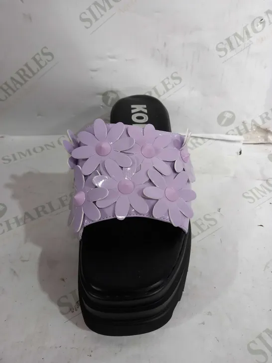 PAIR OF KOI VEGAN LEATHER PLATFORM SQUARE TOE SANDALS IN BLACK WITH PURPLE FLOWER DESIGN - SIZE 6