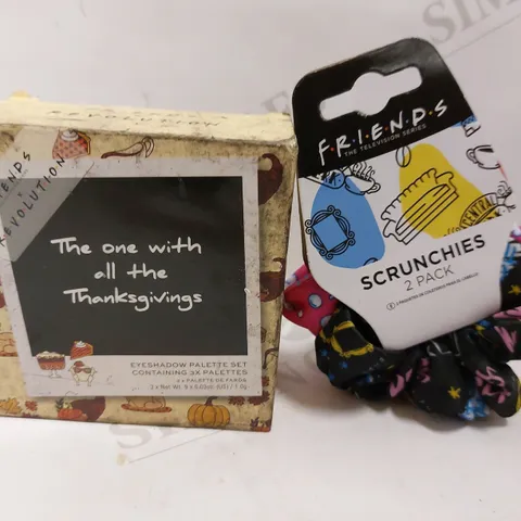 BOX OF 2 F.R.I.E.N.D.S ITEMS TO INCLUDE REVOLUTION EYESHADOW PALETTE AND SCRUNCHIE