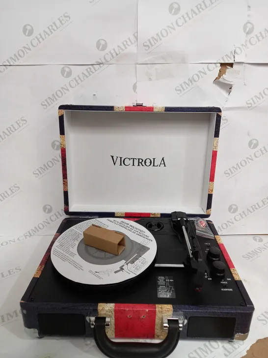 VICTROLA JOURNEY PORTABLE RECORD PLAYER (BOX WATER DAMAGED) 