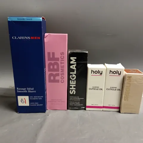 6 BOXED HEALTH AND BEAUTY PRODUCTS TO INCLUDE HOLY GELS ALMOND CUTICLE OIL, CLARINS MEN SMOOTH SHAVE FOAMING GEL, SHEGLAM COMPLEXION PRO MATTE FOUNDATION, RBF MOISTURISING MAKEUP SETTING SPRAY 