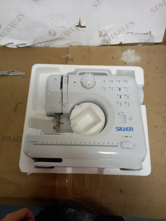 SILVER MINI SEWING MACHINE