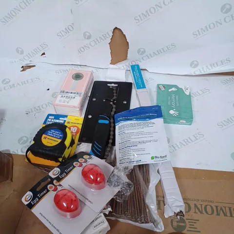 BOX OF ASSORTED HOUSEHOLD ITEMS TOO INCLUDE TAPE MEASURES AND TV REMOTES 