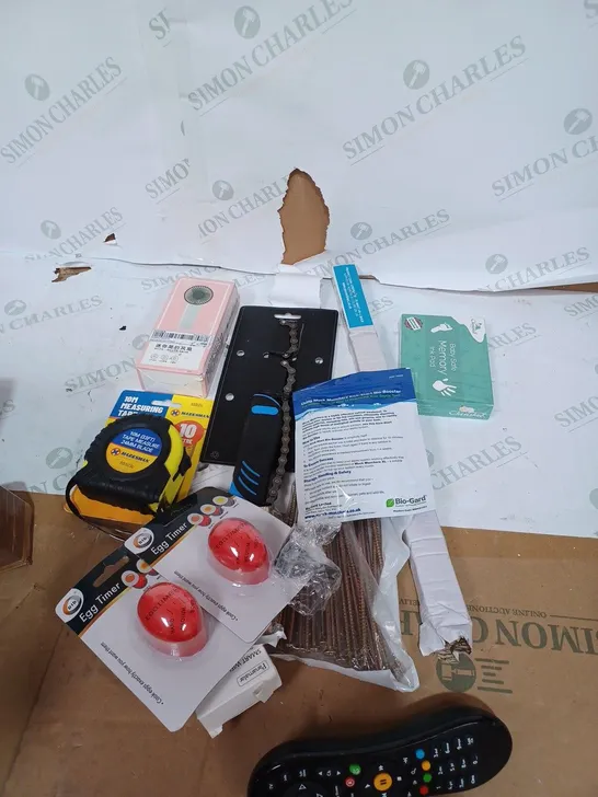 BOX OF ASSORTED HOUSEHOLD ITEMS TOO INCLUDE TAPE MEASURES AND TV REMOTES 