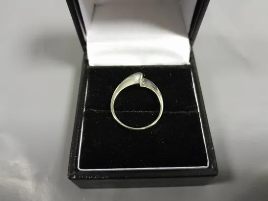 18CT WHITE GOLD NATURAL DIAMOND SOLITAIRE TWIST RING