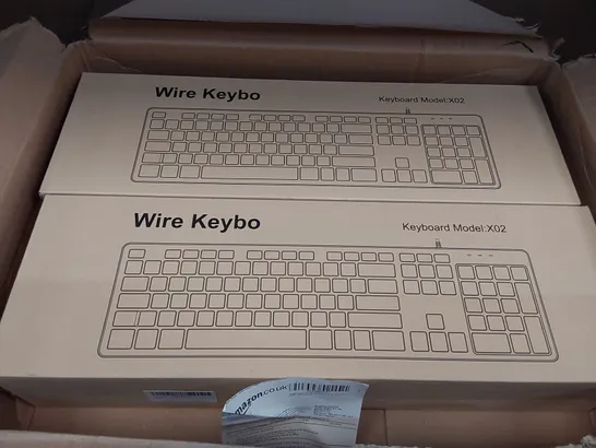 BOXED 2X BRAND NEW WIRED X02 KEYBOARDS (1 BOX)