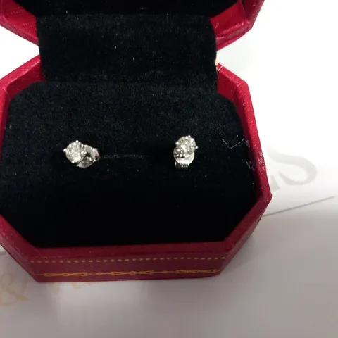 DESIGNER WHITE GOLD STUD EARRINGS