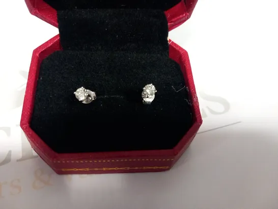 DESIGNER WHITE GOLD STUD EARRINGS