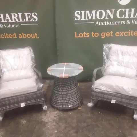 PAIR OF LINEA RATTAN ROCKING CHAIRS WITH GLASS-TOPPED TABLE (1 BOX)