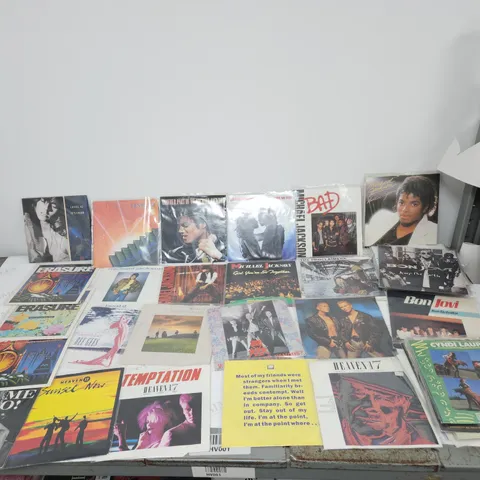 A COLLECTION OF 46 X VINYL SINGLES. MOSTLY 80S ETC. PET SHOP BOYS, BRUCE SPRINGSTEEN, ULTRAVOX ETC. TO INCLUDE POSTER VERSION. IN EXCELLENT CONDITION.