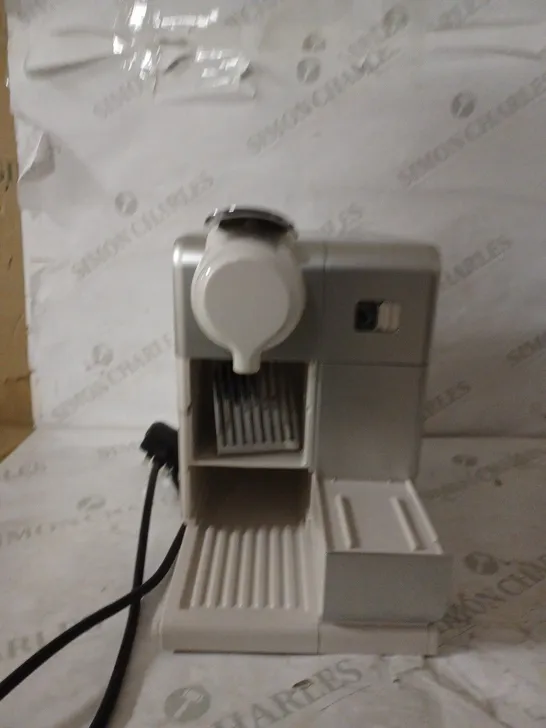 DELONGHI NESPRESSO MACHINE 