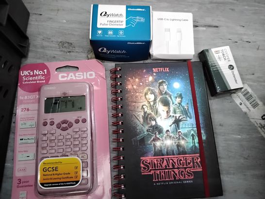 TOTE OF ASSORTED ITEMS INCLUDING CASIO SCIENTIFIC CALCULATOR, STRANGER THINGS NOTEBOOK, USB-C TO LIGHTENING CABLE, FINGERTIP PULSE OXIMETER, COOPER TORCH