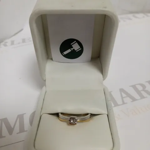 DESIGNER 18CT GOLD RING SET WITH A PRINCESS CUT DIAMOND