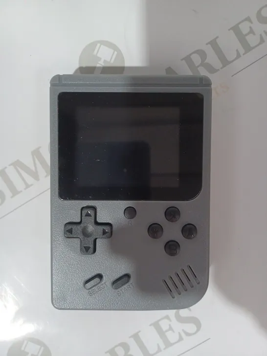 BOXED GAME BOX PLUS HANDHELD GAMING DEVICE IN GREY