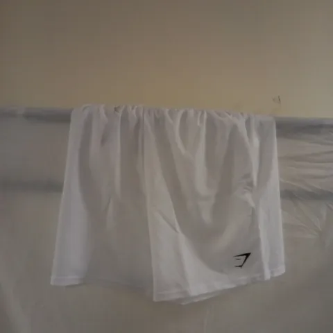 WHITE GYMSHARK SHORTS SIZE M