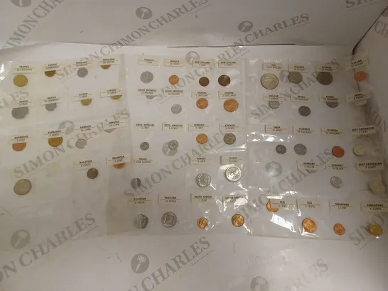 COLLECTION OF ASSORTED COINS IN VARIOUS CURRENCIES FROM AROUND THE WORLD