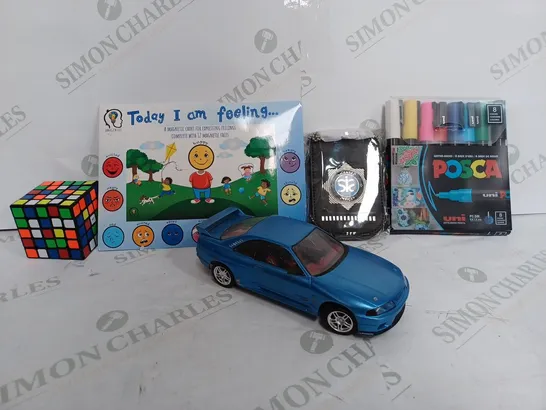 BOX OF APPROX 20 ASSORTED TOYS TO INCLUDE - NISSAN SKYLINE R34 MODEL - UNI POSCA PENS - AMAGENIUS TODAY I AM FEELING ECT