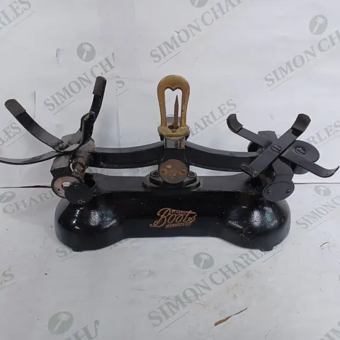 VINTAGE BOOTS THE CHEMIST CAST IRON SCALES