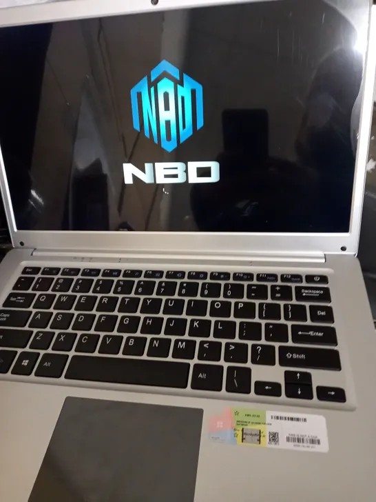 NBD SILVER LAPTOP APPROX. 13.7" SCREEN, INCLUDES MOUSE, EARPHONES AND UNIQUE CASE 