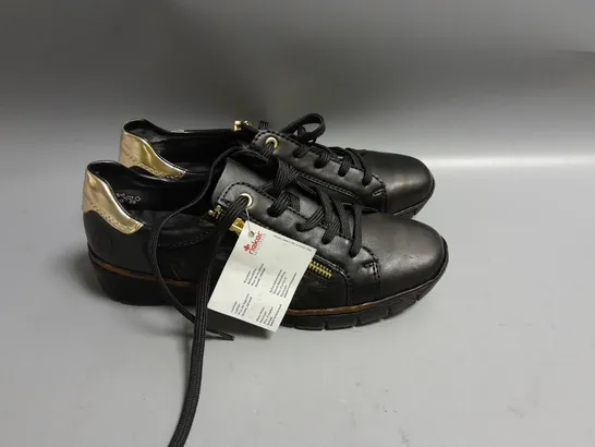 BOXED RIEKER ANTISTRESS BLACK TRAINERS WITH GOLD TRIM SIZE EUR 39