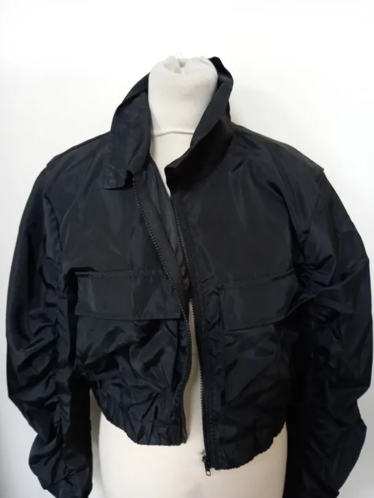 APPROXIMATELY 20 ASSORTED CLOTHING ITEMS TO INCLUDE BARBOUR JACKET SIZE 10, FAUX FUR CROPPED JACKET, EILLY BAZAR CROPPED JACKET IN BLACK SIZE XL 