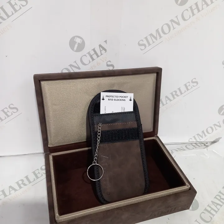 BROWN ANTI THEFT ANTI SCAN KEY PROTECTOR 4421234-Simon Charles Auctioneers