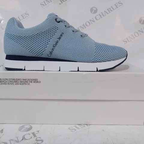 BOXED PAIR OF CALVIN KLEIN TRAINERS IN BLUE EU SIZE 38