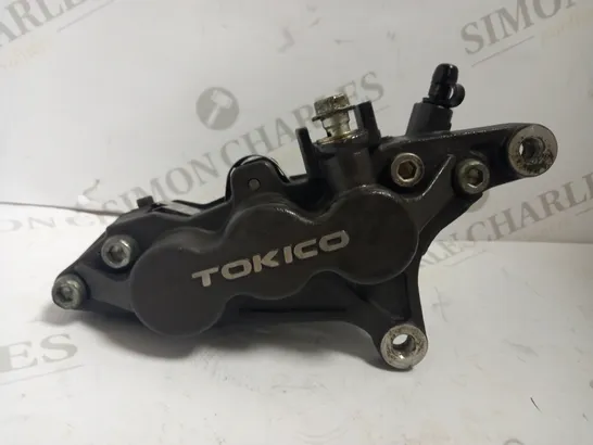 TOKICO PISTON POT FRONT BRAKE CALIPER 