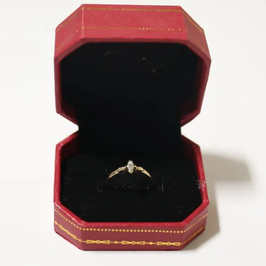 9CT YELLOW GOLD SOLITAIRE RING SET WITH A NATURAL MARQUISE CUT DIAMOND