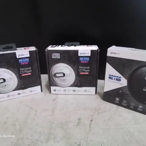 CASE OF APPROXIMATELY 216 GROOVE RETRO SERIES PERSONAL CD PLAYERS