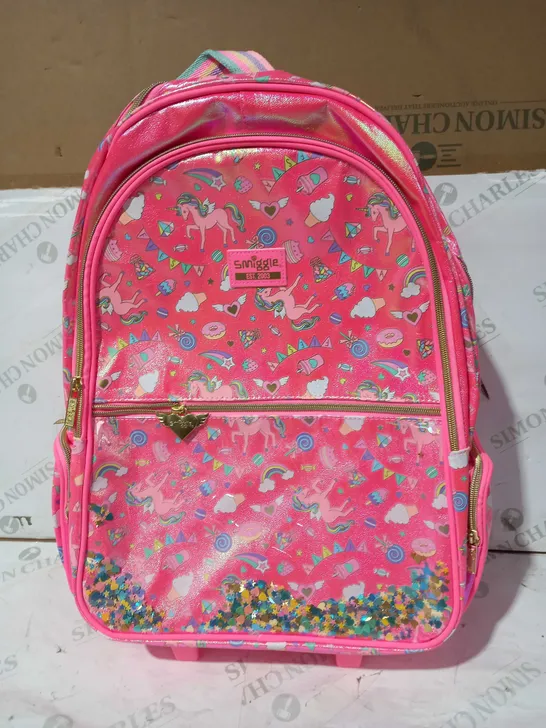 SMIGGLE BACKBAG WITH EXTENDABLE HANDLE AND WHEELS IN PINK WITH RAINBOW UNICORN/TREAT DESIGN