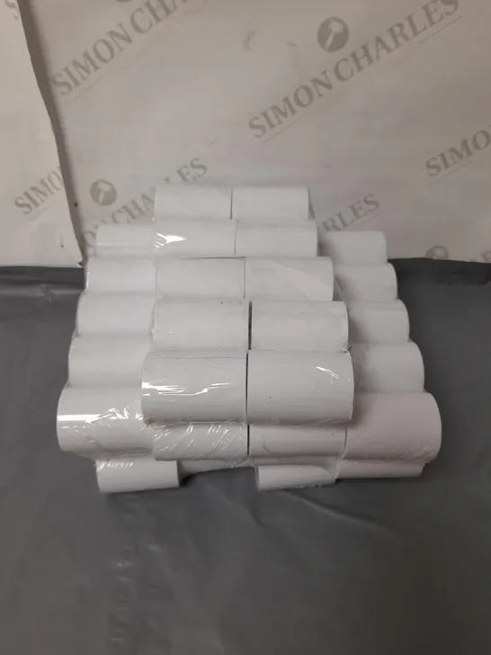 LOT OF 7 PACKS OF SMALL TILL ROLLS. 10 ROLLS PER PACK