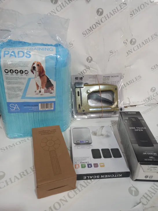 BOX OF APPROXIMATELY 15 ASSORTED ITEMS TO INCLUDE PUPPY TRAINING PADS, FRAME TACKER, KITCHEN SCALES ETC