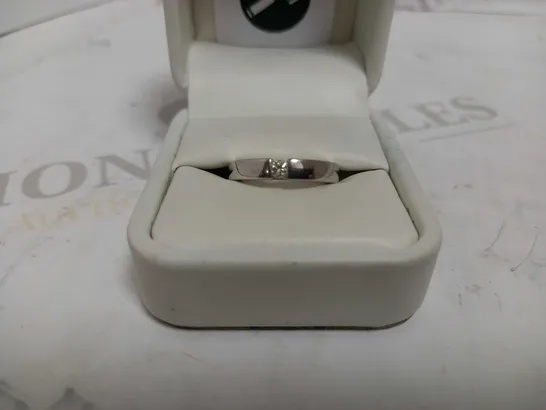 DESIGNER 18CT WHITE GOLD SOLITAIRE RING TENSION SET WITH A DIAMOND